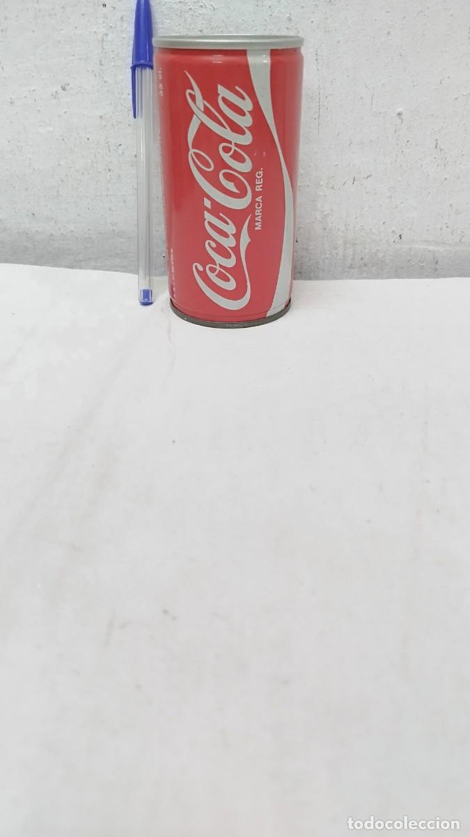 Collezionismo di Coca-Cola e Pepsi: Antigua lata vac&iacute;a de Coca-Cola MARCA REG. 33Cl