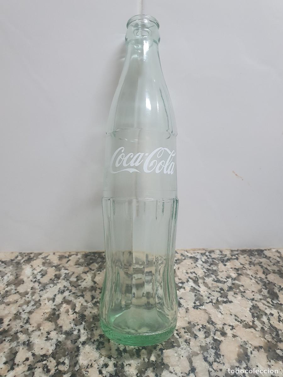 Collectionnisme de Coca-Cola et Pepsi: BOTELLA COCA-COLA ESTA BOTELLA DE 350ML CONTIENE 360KL147KCAL 7% - 100 ML 180KJ42 KCAL.