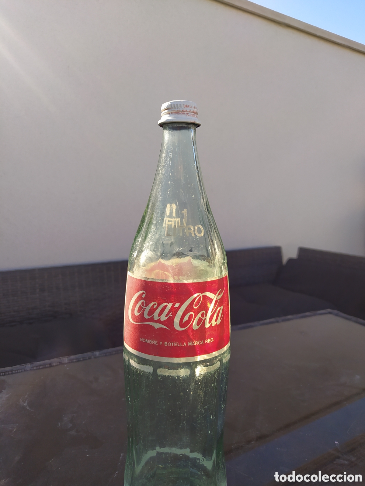 Collecting of Coca-Cola and Pepsi: Antigua botella coca cola 1 litro con su tapon