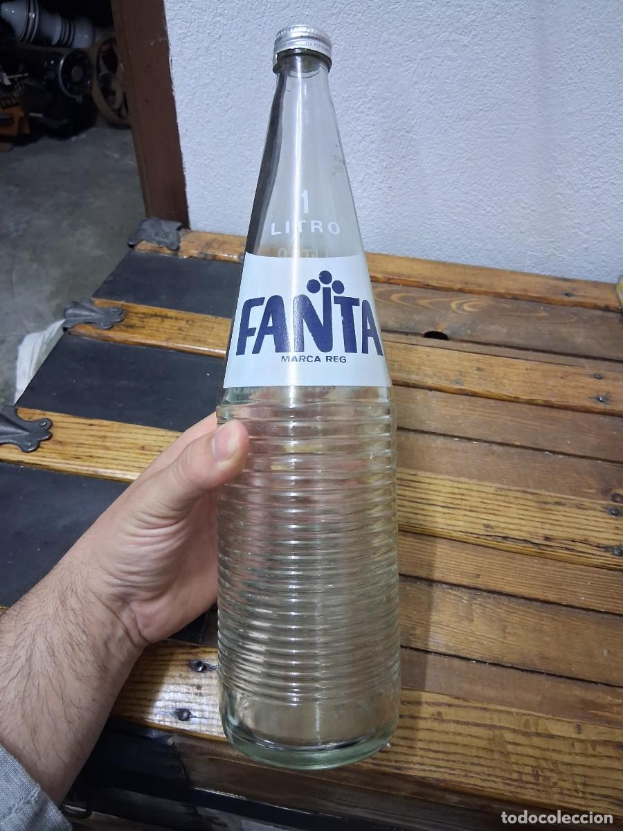 Coleccionismo de Coca-Cola y Pepsi: Botella de 1 litro con chapa de rosca refresco FANTA Surbega M&aacute;laga