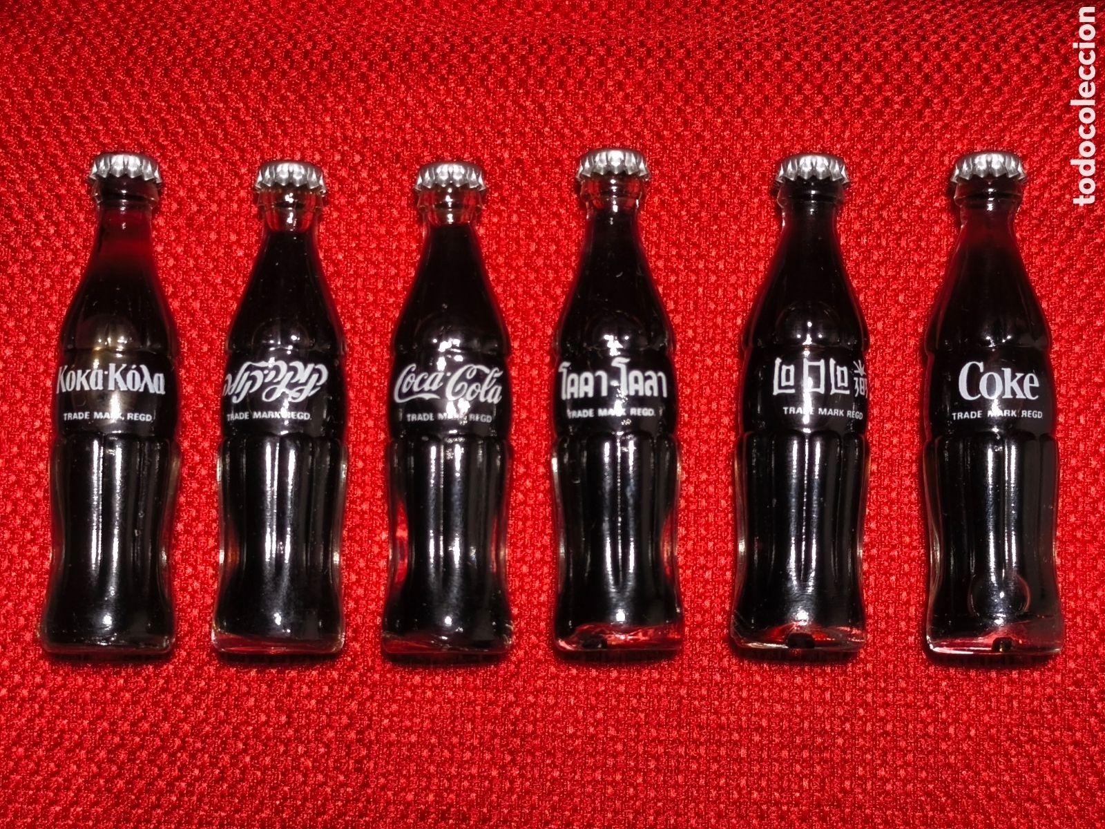 Coleccionismo de Coca-Cola y Pepsi: Lote de mini botellines de COCACOLA distintos pa&iacute;ses