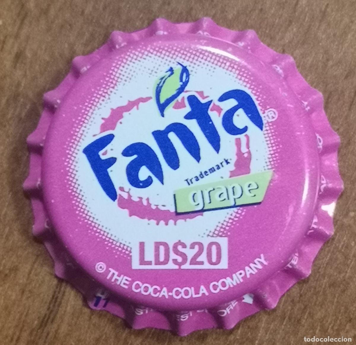 Coleccionismo de Coca-Cola y Pepsi: CHAPA TAP&Oacute;N CORONA ( nueva sin uso ) - FANTA GRAPE ( UVA ) - AFRICA ( LIBERIA )
