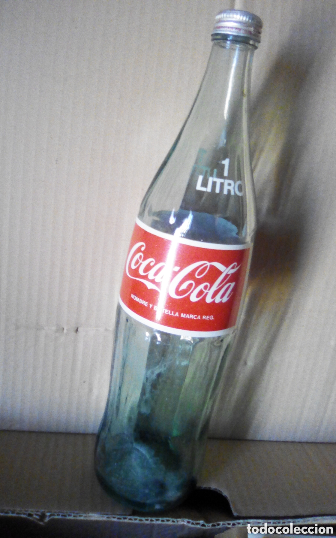 Coleccionismo de Coca-Cola y Pepsi: Antigua botella de Coca-Cola de 1 litro. Colebega, S. A., Valencia.