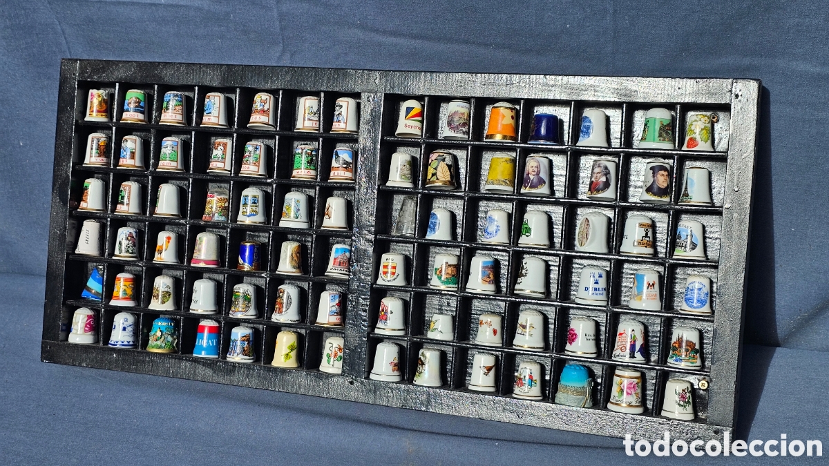 Collectionnisme de d&eacute;s &agrave; coudre: (4) colecci&oacute;n de 80 dedales con mueble expositor