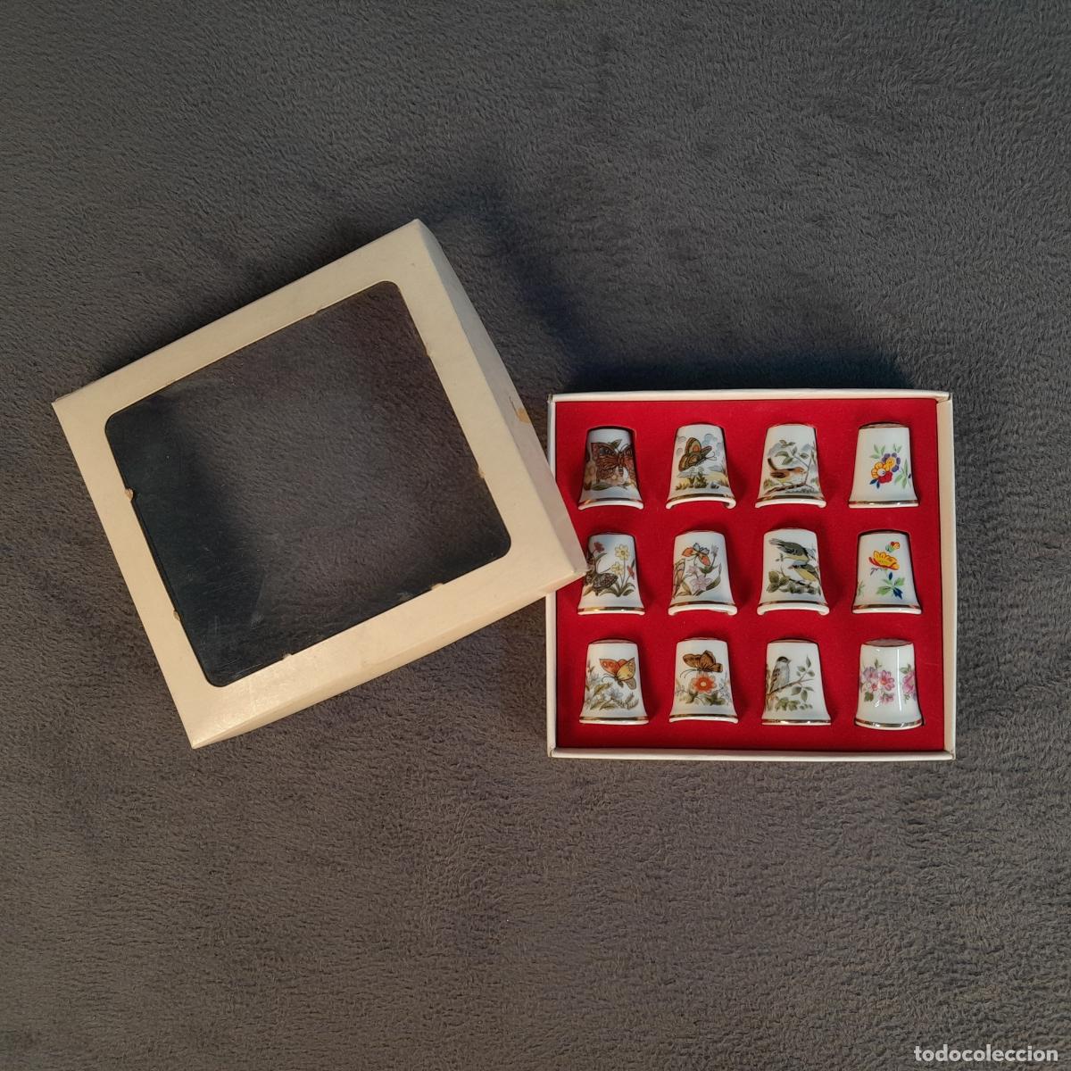 Collectionnisme de d&eacute;s &agrave; coudre: DL-13. LOTE DE 12 DEDALES EN PORCELANA FINA CON DIFERENTES DECORACIONES CON ESTUCHE. JAP&Oacute;N. S.XX