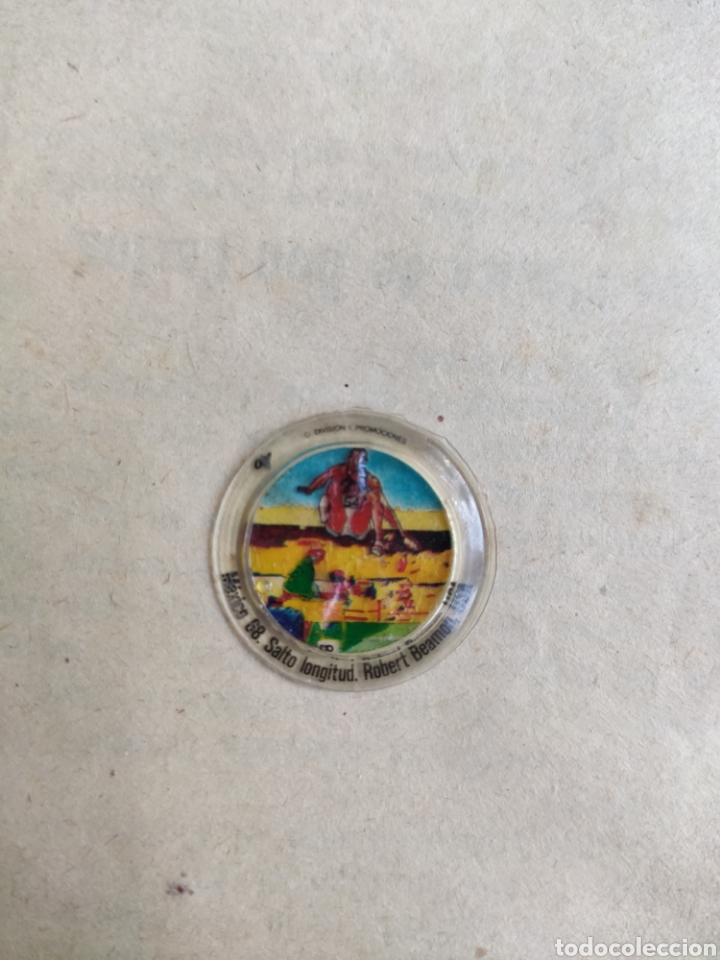 Coleccionismo deportivo: Cromo Chapa Olimpiadas M&eacute;jico 68 Robert Beamon. Salto de Longitud M&eacute;xico 1968