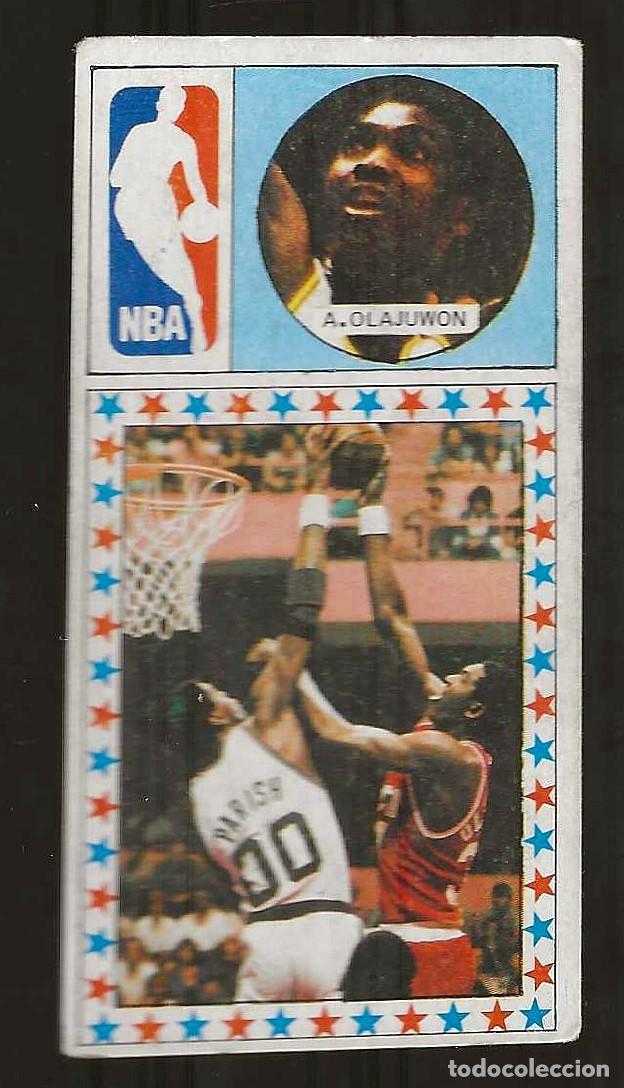 Sports collectibles: ED. MERCHANTE -- BASKET 1986-87 -- N&ordm; 173 A. OLAJUWON