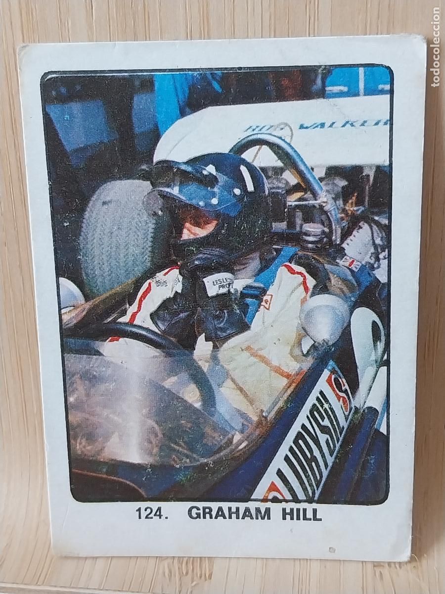 Coleccionismo deportivo: GRAHAM HILL A&Ntilde;O 1974 CAMPEONES DEPORTE MUNDIAL KEISA CROMO 124 SIN PEGAR NUNCA ORIGINAL