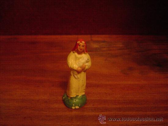 Figures of Bethlehem: Figurita de Pesebre de barro.