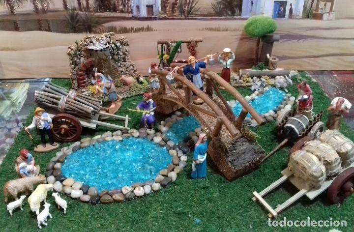 Figuras de Bel&eacute;n: Conjunto 23 piezas decoracion rio lago carretas pozo fuentes y animales. Figuras belen lote10