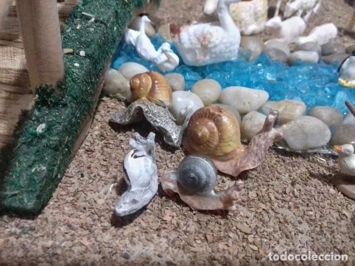 Figuren f&uuml;r Weihnachtskrippen: Cojunto 12 animales caracoles camellos vacas pajaritos. Figuras belen