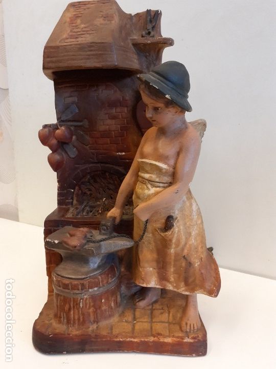 Figuras de Pres&eacute;pios: IMAGEN DE CUPIDO COMO HERRERO FORJADOR