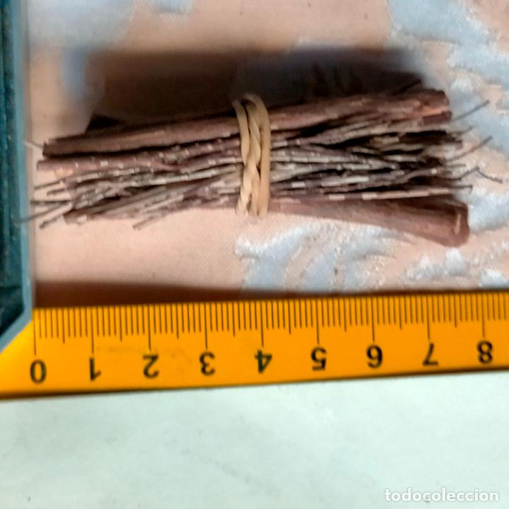 Statuine di Presepe: le&ntilde;a para portal de belen