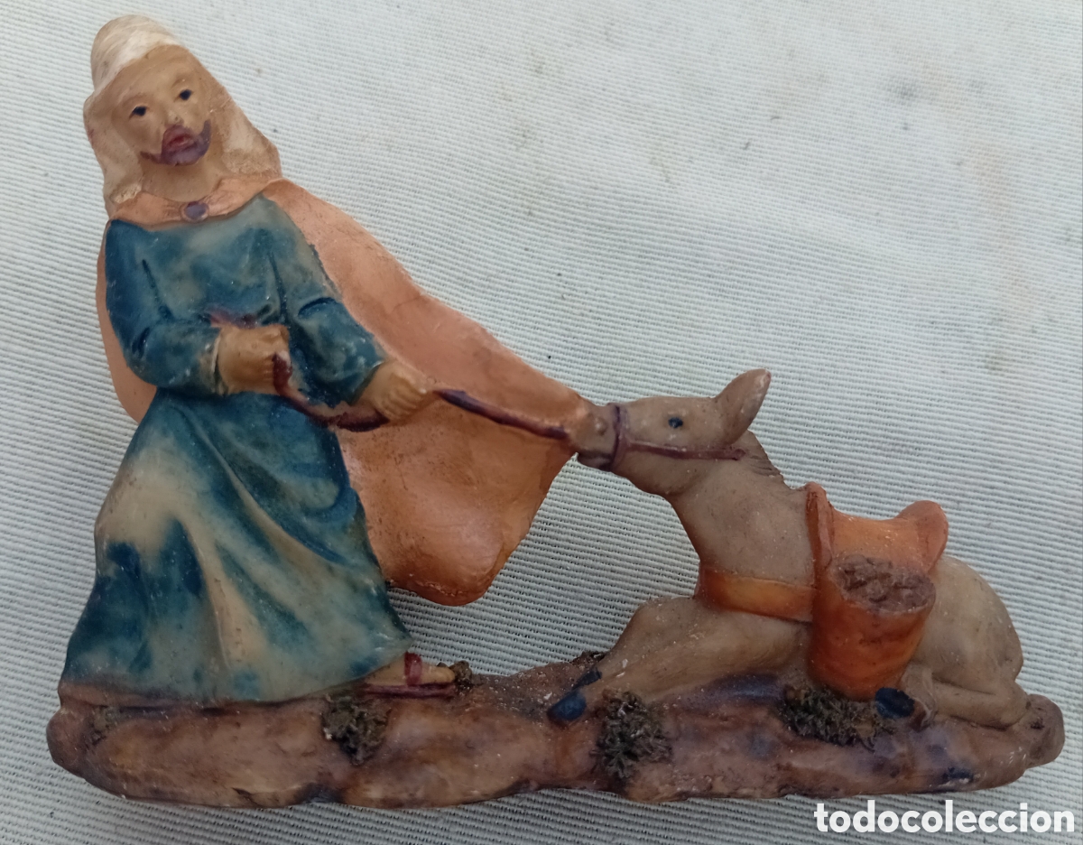 Figuren f&uuml;r Weihnachtskrippen: figura belen terracota hombre guarda borrico