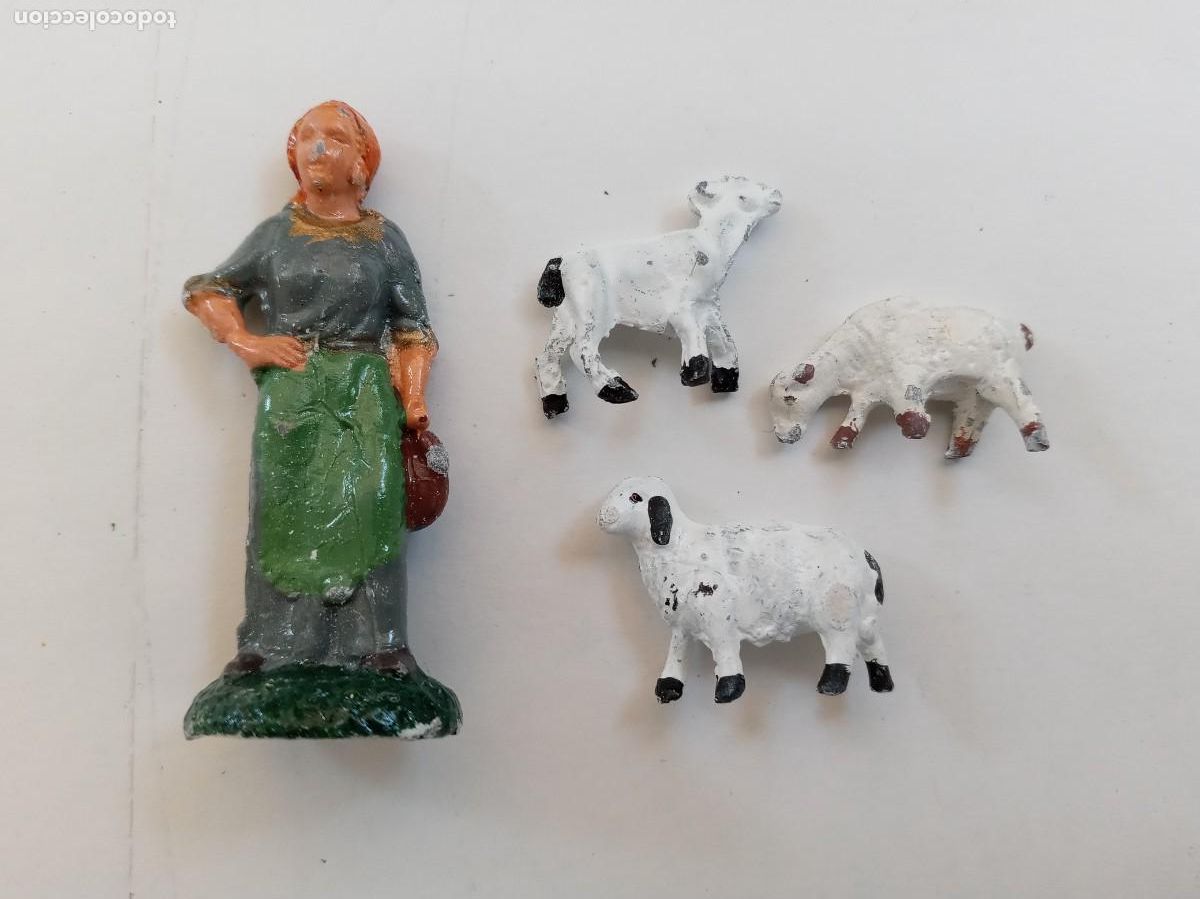 Figuras de Bel&eacute;n: LOTE DE 4 FIGURAS DEL BELEN : PASTORA CON CABRA Y OVEJAS . &iexcl; DE PLOMO !!