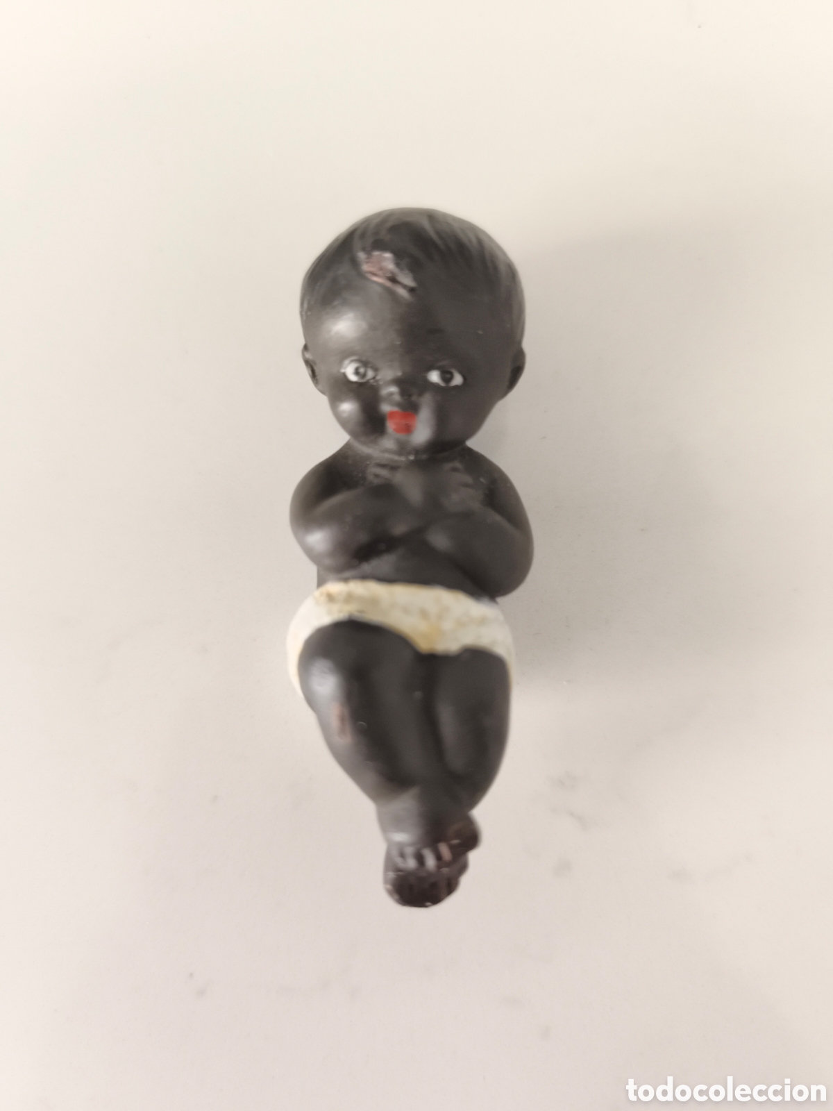 Figuras de Bel&eacute;n: Antiguo ni&ntilde;o Jes&uacute;s negrito para el portal de Bel&eacute;n de Estuco