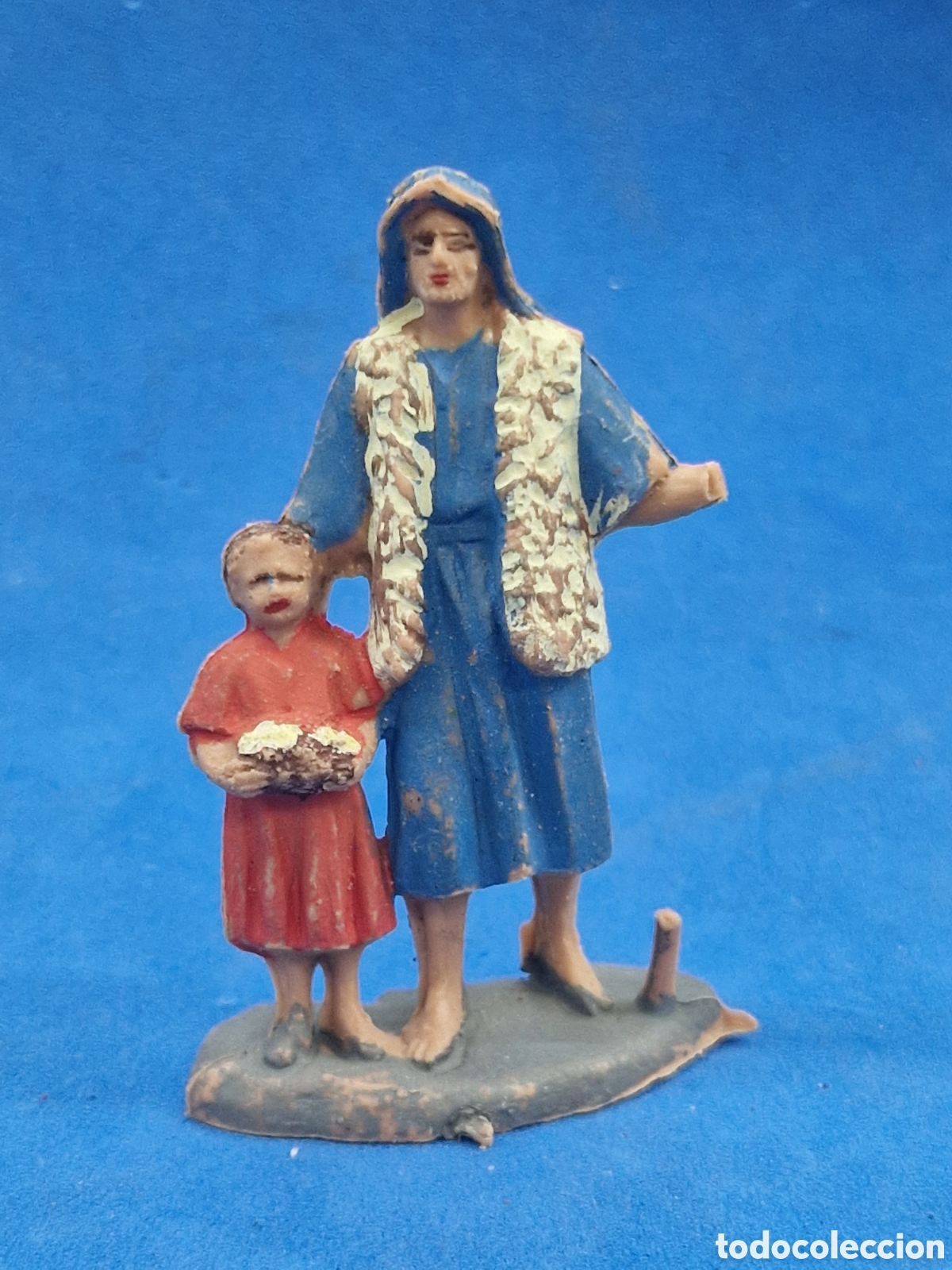 Figuras de Bel&eacute;n: Hebreo con ni&ntilde;o , figura de belen, pl&aacute;stico