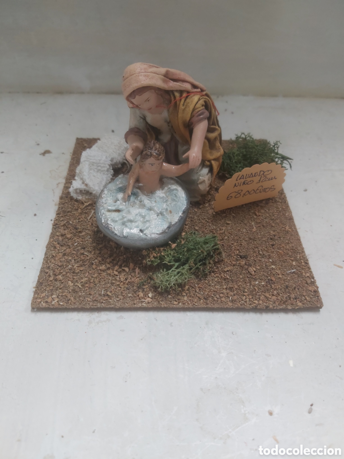 Figuras de Bel&eacute;n: Belenes figura lavando ni&ntilde;o.