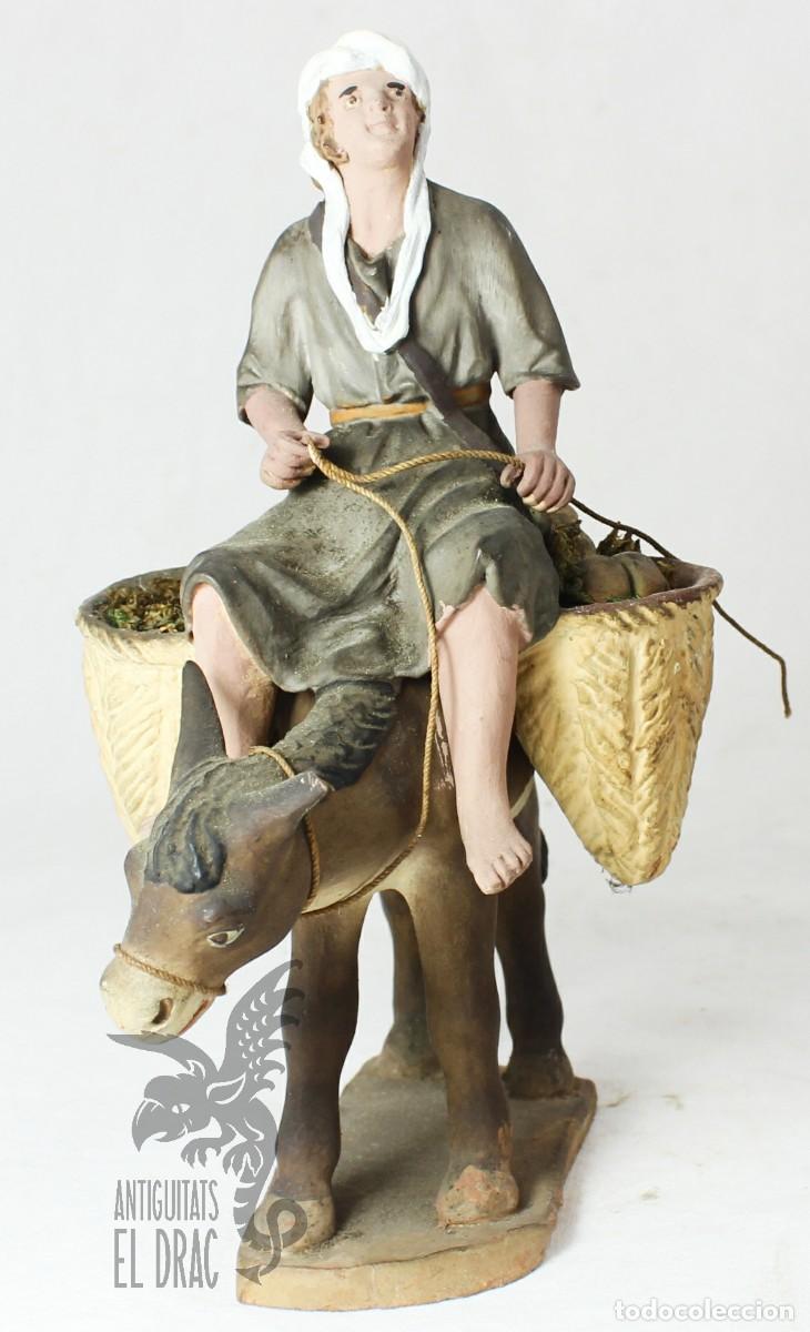 Figuras de Bel&eacute;n: Figura antigua pastor montado en un burro con las alforjas bel&eacute;n Pere Teixidor 1930