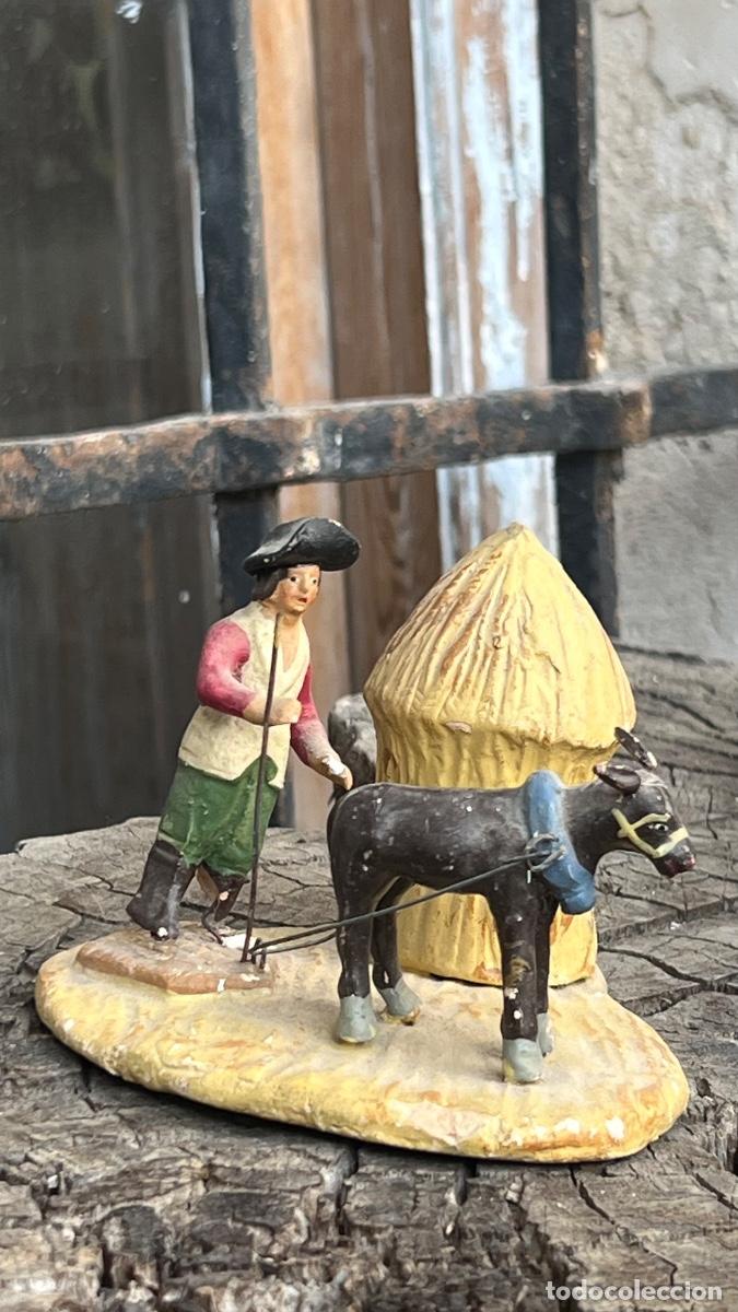 Figuras de Bel&eacute;n: Figura barro Bel&eacute;n antigua burro hombre heno secando cacharreria murcia