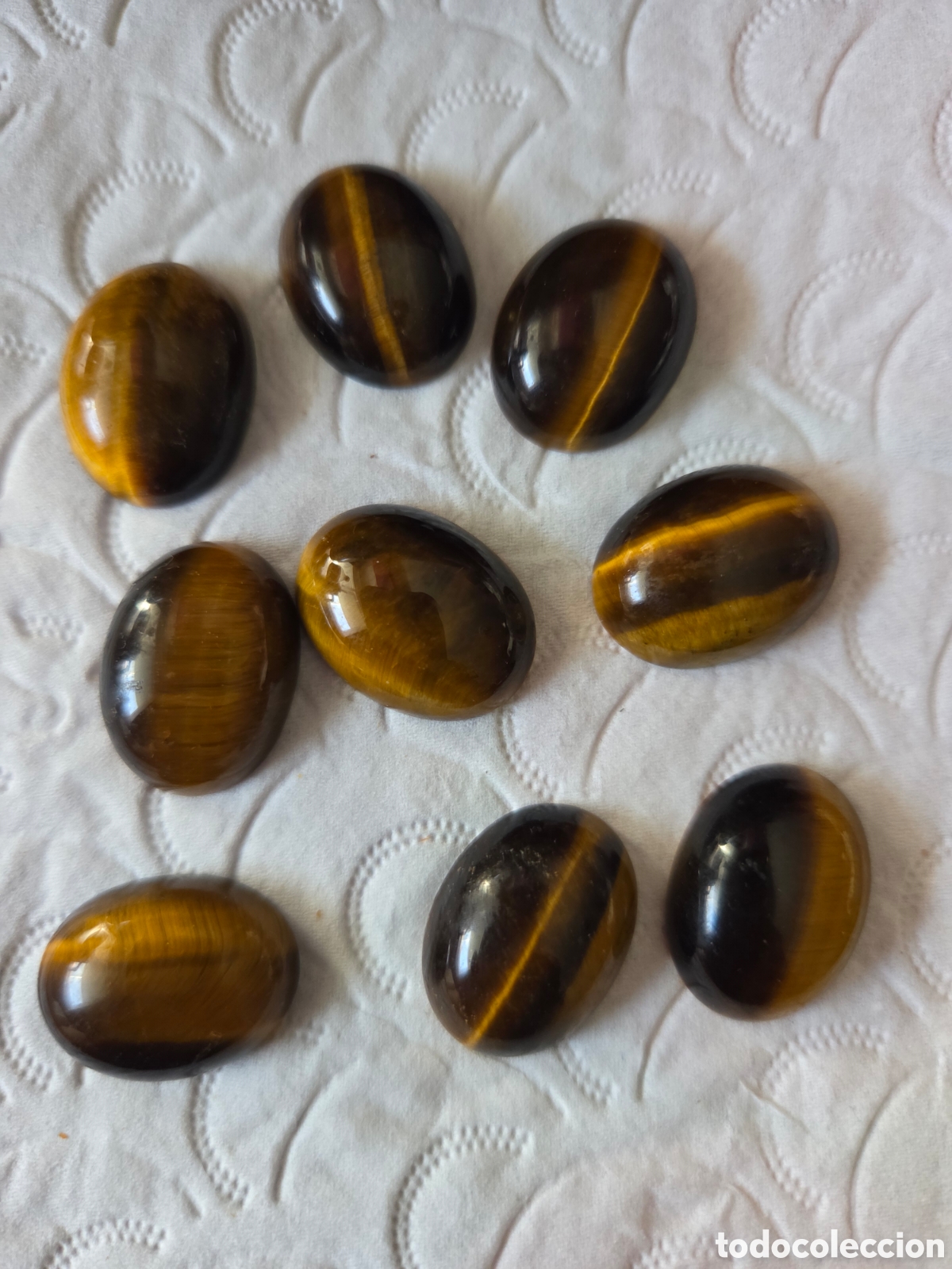 Sammlung von Edelsteinen: Lote 9 piedras ojo de tigre pulidas - cabujones minerales