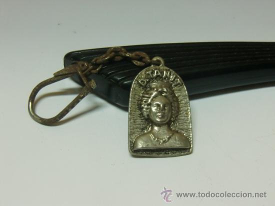 Collection of Keychains: Llavero D. Tanit. Busto de mujer en relieve