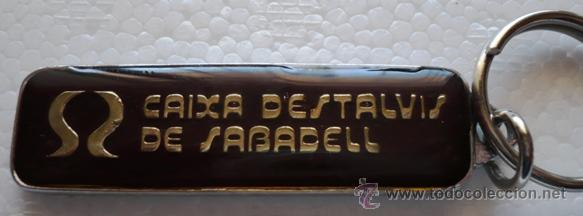 Coleccionismo de llaveros: LLAVERO CAIXA ESTALVIS SABADELL. METAL ESMALTADO. BANCO.