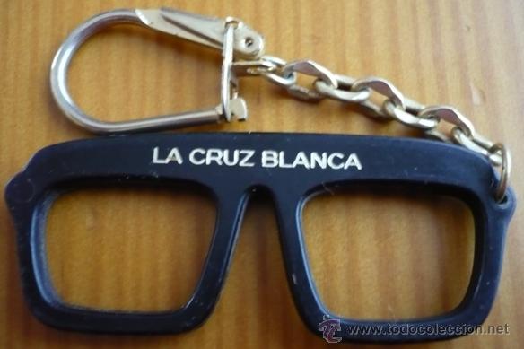 Collectionnisme de portes-cl&eacute;s: LLAVERO GAFAS LA CRUZ BLANCA. GAFAS-LENTILLAS-AUDIFONOS. PLASTICO Y METAL DORADO.