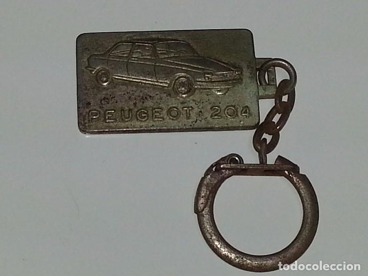 Coleccionismo de llaveros: ANTIGUO LLAVERO PUBLICITARIO COCHE  PEUGEOT 204 GARAGE CENTRAL GLUSES SAVOIE FRANCIA A&Ntilde;OS 60