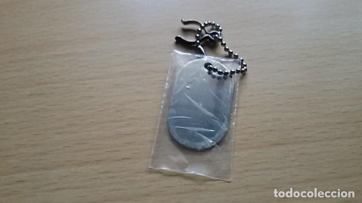 Coleccionismo de llaveros: PLACA MET&Aacute;LICA PERFUME BRUNO BANANI - Foto 2