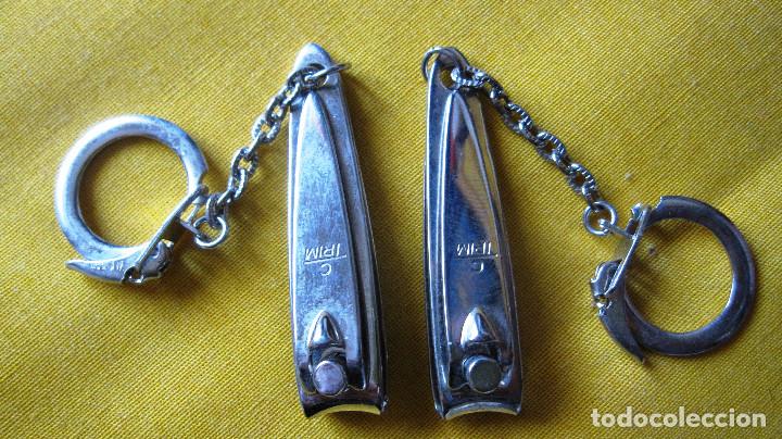 Coleccionismo de llaveros: lote de dos llaveros corta u&ntilde;as de c trim. impecables - Foto 1