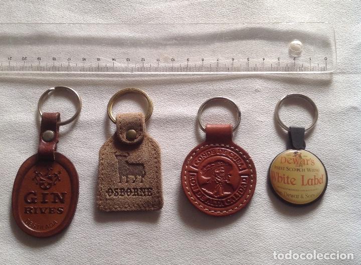 Coleccionismo de llaveros: CUATRO LLAVEROS MARCAS BEBIDAS EN PIEL, CUERO...