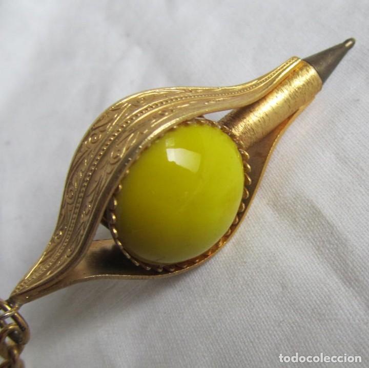 Collection of Keychains: Llavero bol&iacute;grafo sin tinta bola de vidrio y metal dorado