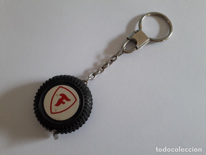Coleccionismo de llaveros: llavero de rueda firestone con metro (medidas metricas) diametro 3,5cm aprox