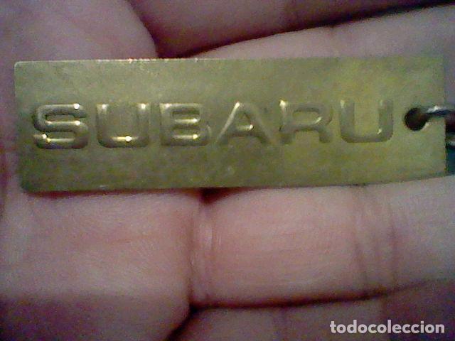 Coleccionismo de llaveros: SUBARU COCHE LLAVERO PLACA METAL TONO BRONCE 6 CMS LARGO