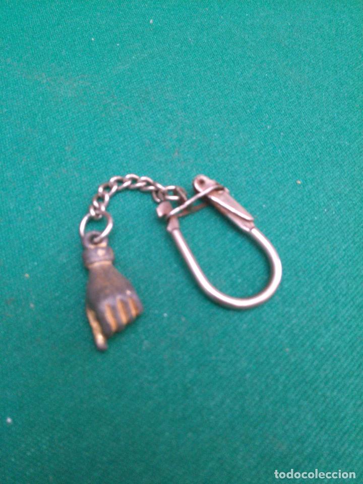 Collectionnisme de portes-cl&eacute;s: PEQUE&Ntilde;A MANO O PU&Ntilde;O CERRADO - METALICO
