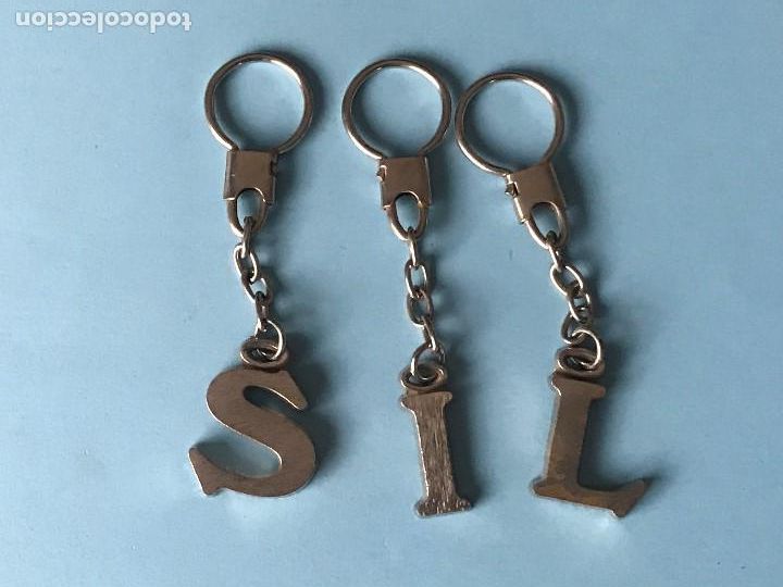 Collection of Keychains: LOTE 3 LLAVEROS LETRAS METALICAS S L I LLAVERO