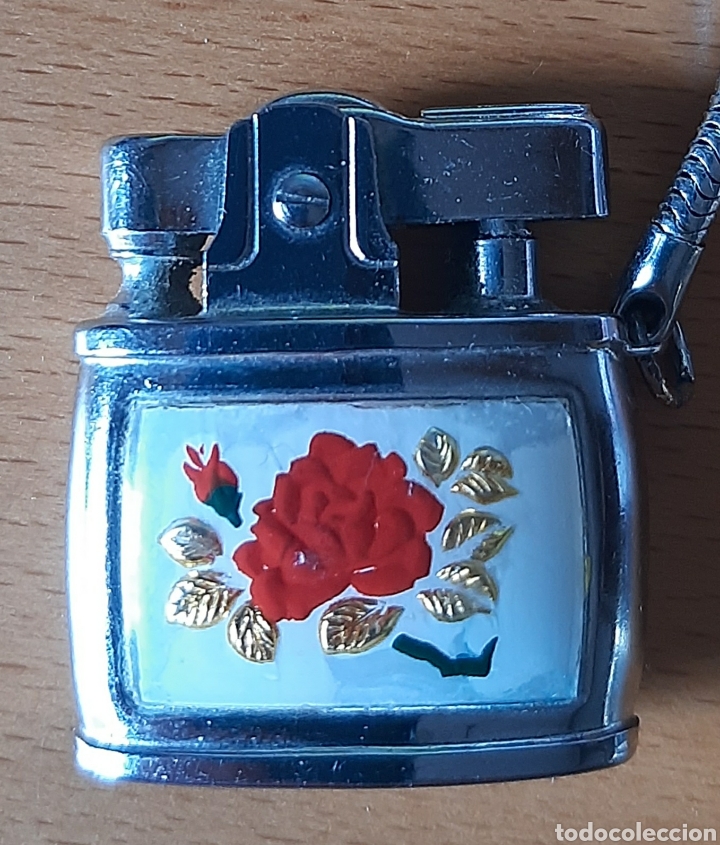 Collectionnisme de portes-cl&eacute;s: Llavero peque&ntilde;o mechero con dibujo de rosa