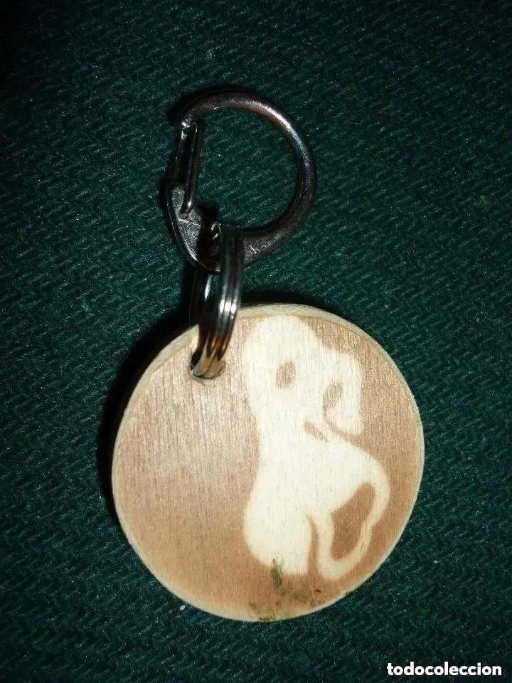 Sammlung von Schl&uuml;sselanh&auml;ngern: LLAVERO DE MADERA DE LA FUNDACI&Oacute;N MONA