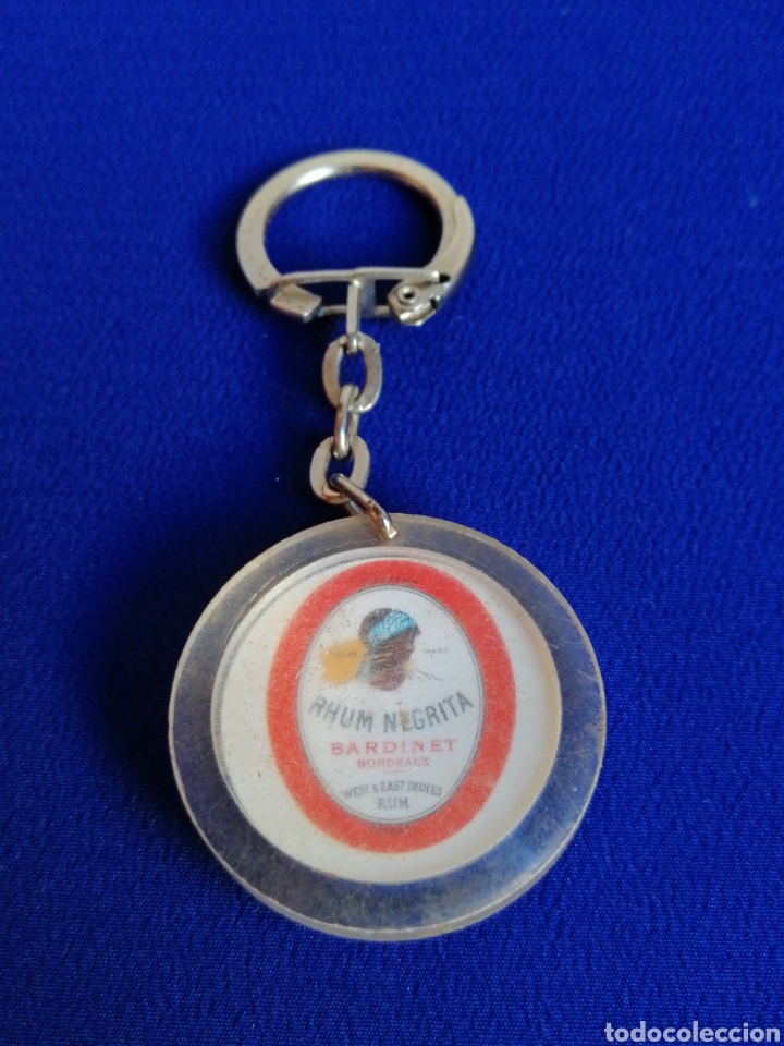 Collection of Keychains: RON NEGRITA PUBLICIDAD LLAVERO A&Ntilde;OS 60