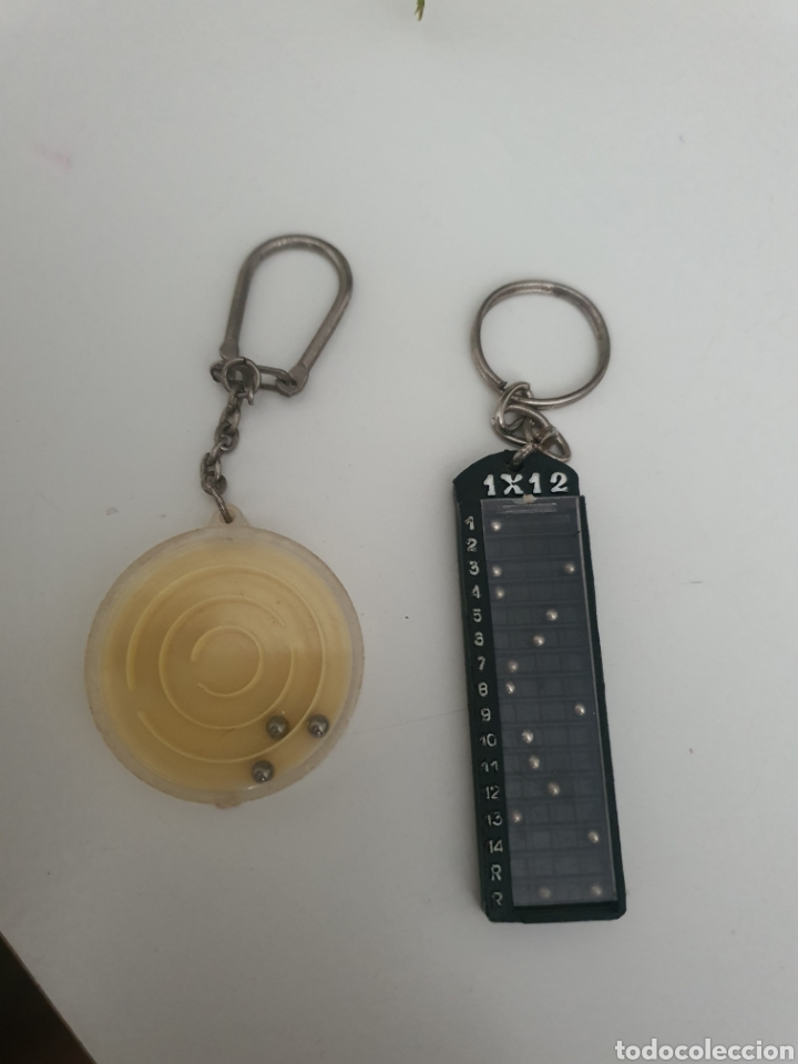 Coleccionismo de llaveros: Antiguos llaveros quiniela y publicidad lea sol
