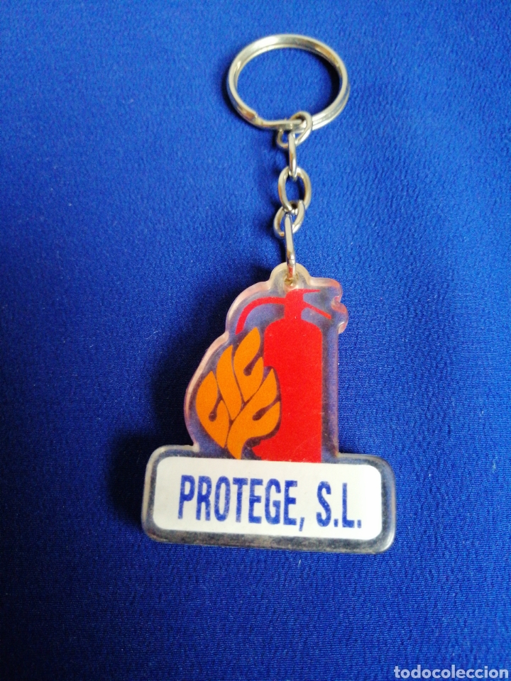 Collection of Keychains: PROT&Eacute;GETE, S. L. EXTINTOR LLAVERO PUBLICIDAD