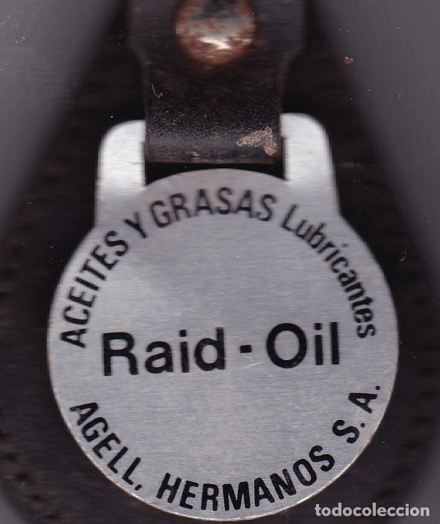 Collectionnisme de portes-cl&eacute;s: llavero aceites y grasas Raid - Oil Agell Hnos. S.A. a&ntilde;os 80
