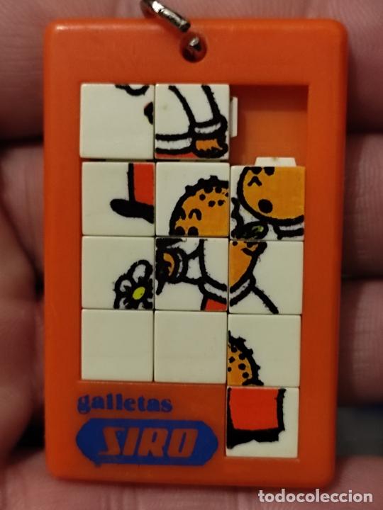 Sammlung von Schl&uuml;sselanh&auml;ngern: GALLETAS SIRO PERSONAJE WESTERN LLAVERO PUZLE RARO 6 X 3,5 CMS