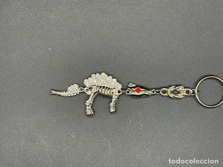 Coleccionismo de llaveros: LLAVERO DINOSAURIO OJOS ROJOS - Foto 1