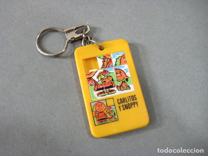 Coleccionismo de llaveros: LLAVERO PUZZLE DE CARLITOS SNOOPY - Foto 1