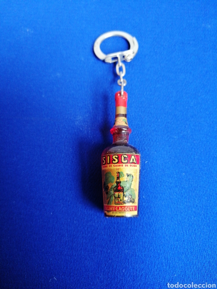 Sammlung von Schl&uuml;sselanh&auml;ngern: BOTELLA SISCA LICOR LLAVERO PUBLICIDAD FRANCIA