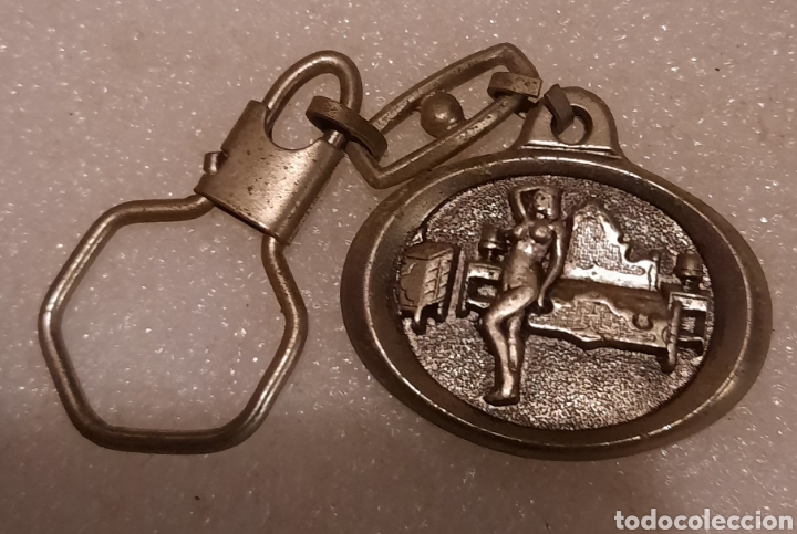 Collezionismo di Portachiavi: Llavero mujer publicidad muebles