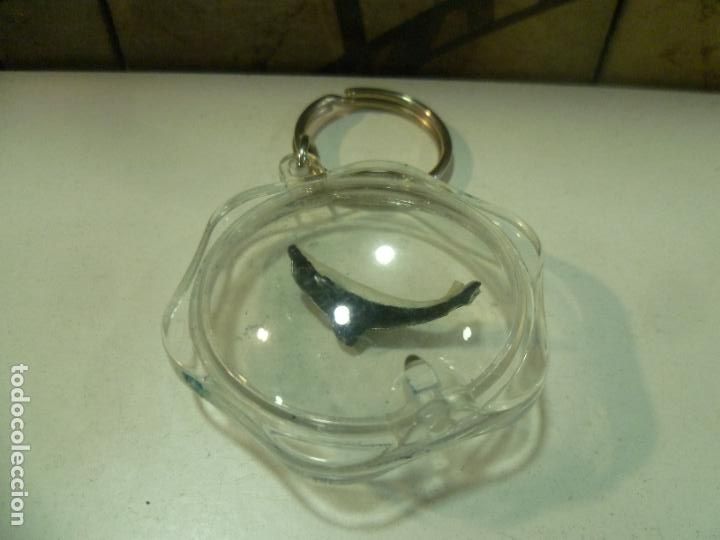 Collectionnisme de portes-cl&eacute;s: Llavero con delf&iacute;n