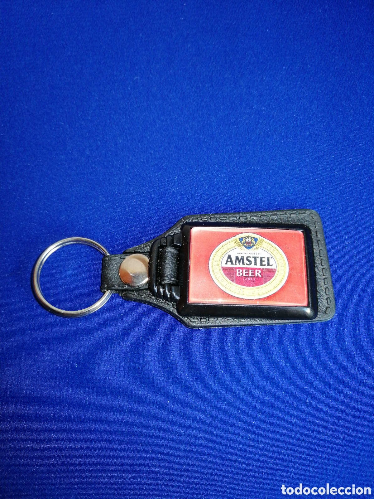 Sammlung von Schl&uuml;sselanh&auml;ngern: CERVEZA AGUILA AMSTEL LLAVERO PUBLICIDAD